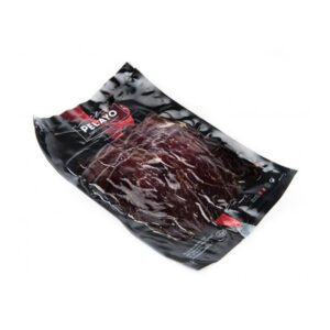 Cecina de boeuf fumée au bois de chêne et tranchée